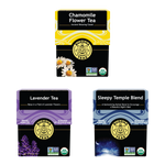 Three boxes of Buddha Teas tea blends on a white background