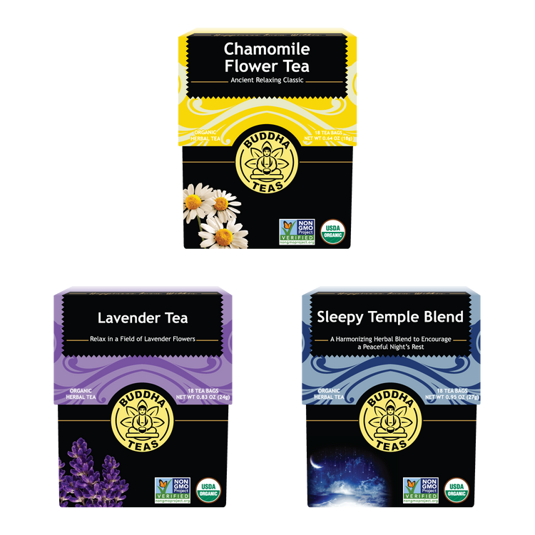 Three boxes of Buddha Teas tea blends on a white background