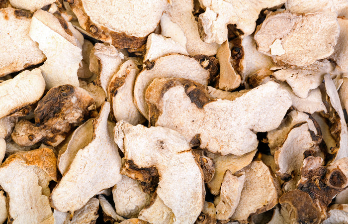 Close-up of a pile of dried dong quai  root