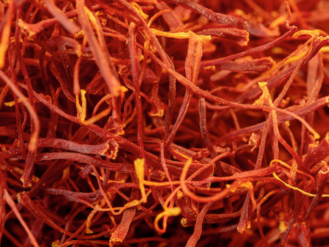 Close-up of saffron threads with a warm color tone